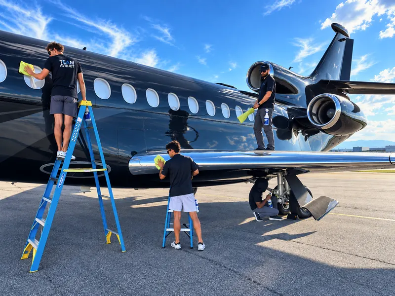 AvidJet team member working to a scheduled appearance program